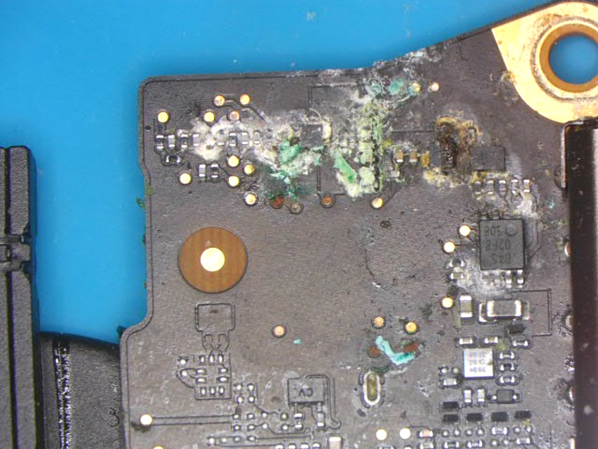 Liquid damage corrosion on a logic board