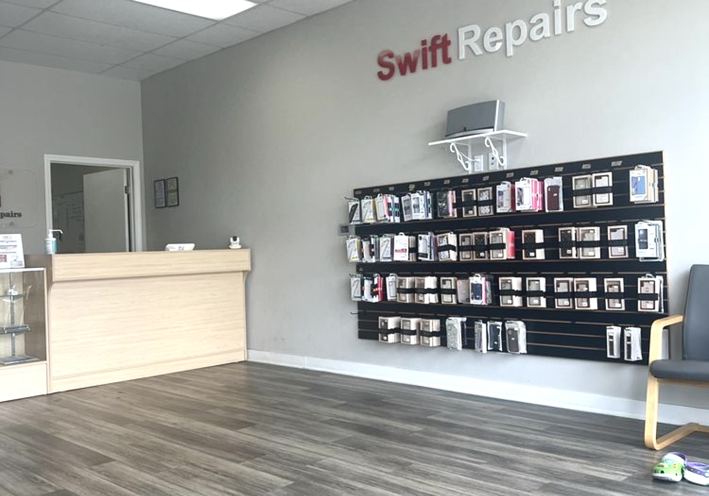 Swift Repairs phone and tablet parts wall
